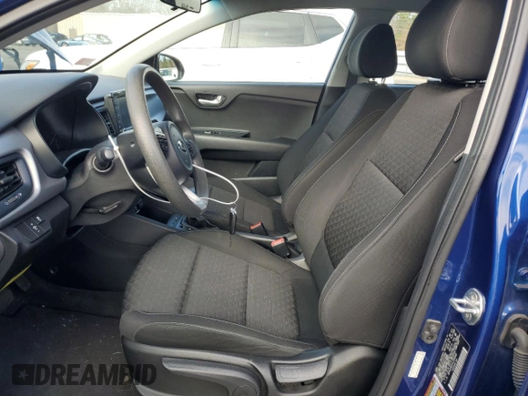 2020 Kia Rio S with VIN 3KPA24AD1LE260040, listed as a Copart auction lot 50292065 with 65,156 mi miles and Salvage Title. Bid and sale history available at DreamBid. Image 7.
