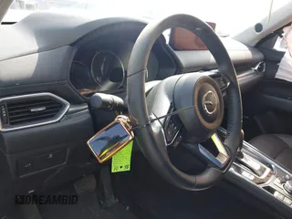 2023 Mazda CX-5 S Premium with VIN JM3KFBDM7P0201038, listed as a IAAI auction lot 41772989 with 26,227 mi miles and . Bid and sale history available at DreamBid. Image 11.