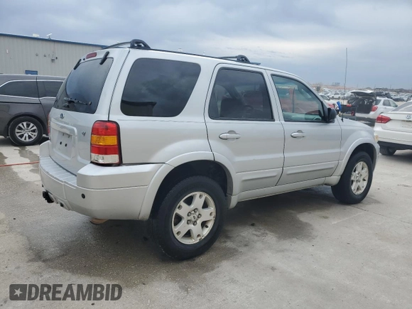 2006 Ford Escape Limited with VIN 1FMCU94196KA99953, listed as a Copart auction lot 88786175 with 154,129 mi miles and Salvage title. Bid and sale history available at DreamBid. Image 3.