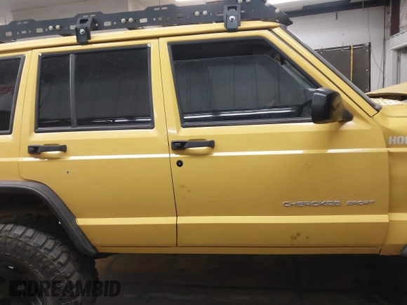2001 Jeep Cherokee Sport with VIN 1J4FF48S41L580319, listed as a IAAI auction lot 42064564 with 257,534 mi miles and . Bid and sale history available at DreamBid. Image 13.