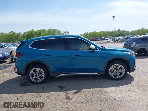 2023 BMW X1 xDrive28i with VIN WBX73EF00P5W52935, listed as a IAAI auction lot 42221084 with 16,394 mi miles and . Bid and sale history available at DreamBid. Image 13.
