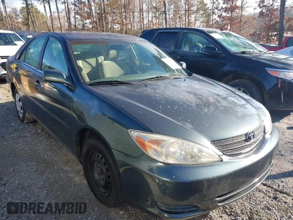 2003 Toyota Camry LE with VIN 4T1BE32KX3U689421, listed as a IAAI auction lot 41566812 with 192,673 mi miles and . Bid and sale history available at DreamBid. Image 1.