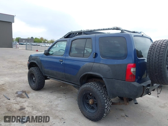 2003 Nissan Xterra SE with VIN 5N1ED28Y63C679397, listed as a IAAI auction lot 42115584 with 164,794 mi miles and . Bid and sale history available at DreamBid. Image 3.