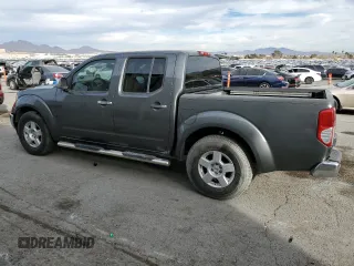 2006 Nissan Frontier SE with VIN 1N6AD07U46C441698, listed as a Copart auction lot 87406004 with 178,760 mi miles and Salvage title. Bid and sale history available at DreamBid. Image 2.
