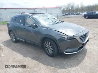 2016 Mazda CX-9 Grand Touring z VIN JM3TCBDY3G0117802, wystawiony jako IAAI lot #42150821 z przebiegiem 157 760 mil mil oraz . Historia ofert i sprzedaży dostępna na DreamBid. Obrazek 1.