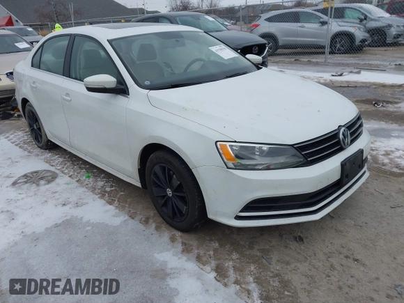 2015 Volkswagen Jetta Sedan 1.8T SE w/Connectivity with VIN 3VWD07AJXFM324240, listed as a IAAI auction lot 41558550 with 141,272 mi miles. Bid and sale history available at carsss.com. Image 1.