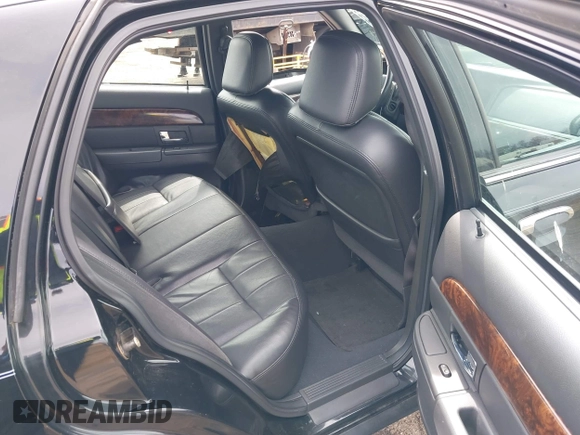 2005 Mercury Grand Marquis LS Premium z VIN 2MEFM75W65X671622, wystawiony jako IAAI lot #41958287 z przebiegiem 154 662 mil mil oraz . Historia ofert i sprzedaży dostępna na DreamBid. Obrazek 8.