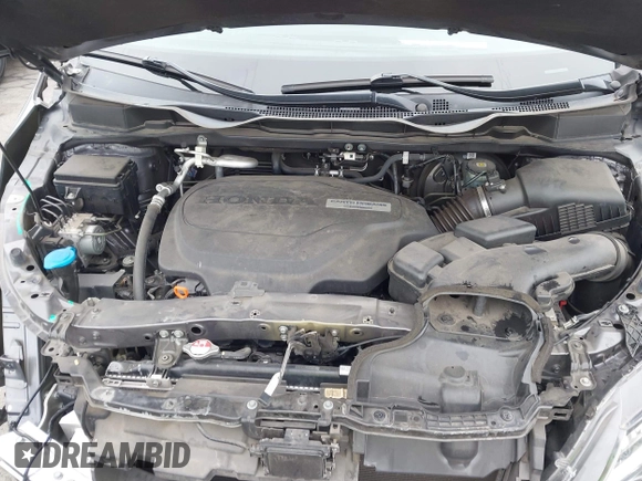 2018 Honda Odyssey Touring with VIN 5FNRL6H88JB062213, listed as a IAAI auction lot 42489379 with 90,578 mi miles and . Bid and sale history available at DreamBid. Image 10.