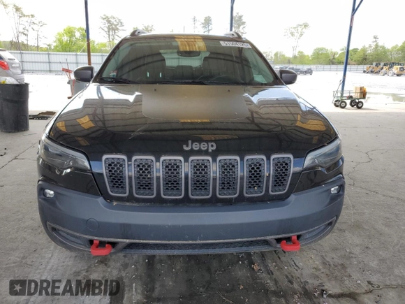 2019 Jeep Cherokee Trailhawk with VIN 1C4PJMBN7KD374676, listed as a Copart auction lot 51504125 with 34,323 mi miles and Salvage Title. Bid and sale history available at DreamBid. Image 5.