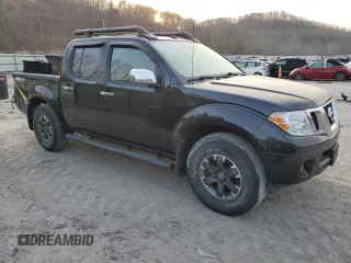 2019 Nissan Frontier Pro-4X with VIN 1N6AD0EV3KN705326, listed as a Copart auction lot 48656925 with 70,904 mi miles and Salvage title. Bid and sale history available at DreamBid. Image 4.