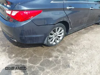 2011 Hyundai Sonata Limited with VIN 5NPEC4AC0BH292770, listed as a IAAI auction lot 42061445 with 122,977 mi miles and . Bid and sale history available at DreamBid. Image 6.