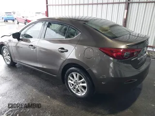 2015 Mazda 3 i Touring with VIN 3MZBM1V72FM215729, listed as a IAAI auction lot 42191673 with 141,471 mi miles and . Bid and sale history available at DreamBid. Image 3.