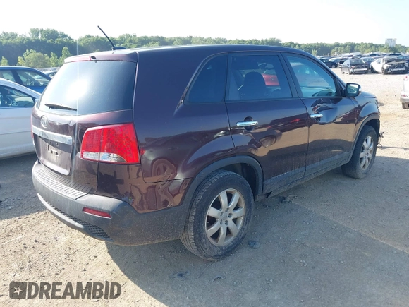 2013 Kia Sorento LX with VIN 5XYKT3A14DG394689, listed as a IAAI auction lot 42646381 with 76,523 mi miles and . Bid and sale history available at DreamBid. Image 4.