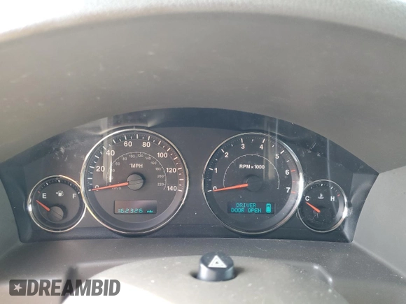 2006 Jeep Commander Limited с VIN 1J8HG58N86C149526, выставлен на аукционе Copart как лот 62910105 с пробегом 162 326 миль миль и Списание • Salvage title. История ставок и продаж доступна на DreamBid. Изображение 9.