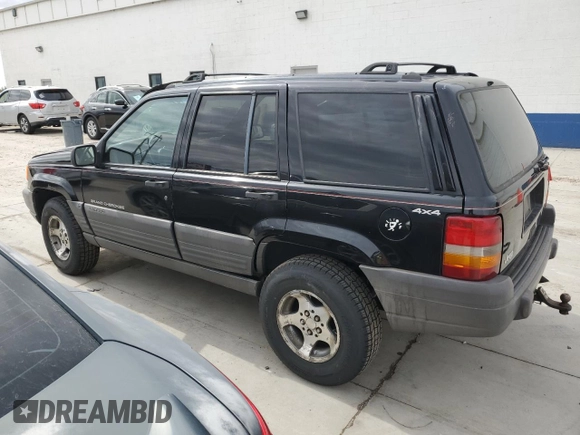 1996 Jeep Grand Cherokee with VIN 1J4EZ58S8TC106529, listed as a Copart auction lot 50163965 with 226,951 mi miles and Salvage title. Bid and sale history available at DreamBid. Image 2.