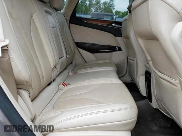 2016 Lincoln MKC Reserve with VIN 5LMTJ3DH3GUJ11911, listed as a Copart auction lot 58439465 with 107,441 mi miles and Salvage title. Bid and sale history available at DreamBid. Image 11.
