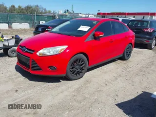 2014 Ford Focus SE with VIN 1FADP3F2XEL164830, listed as a IAAI auction lot 42073107 with 164,519 mi miles. Bid and sale history available at carsss.com. Image 2.