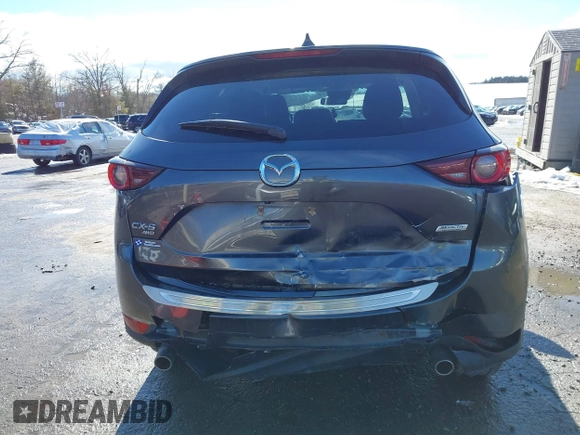 2017 Mazda CX-5 Touring with VIN JM3KFBCL3H0214881, listed as a IAAI auction lot 41694560 with 64,609 mi miles. Bid and sale history available at carsss.com. Image 6.