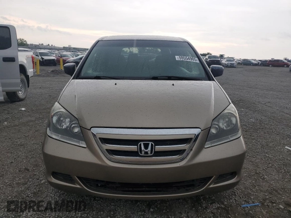 2005 Honda Odyssey LX with VIN 5FNRL382X5B107510, listed as a Copart auction lot 59554905 with 124,393 mi miles and Salvage title. Bid and sale history available at DreamBid. Image 5.