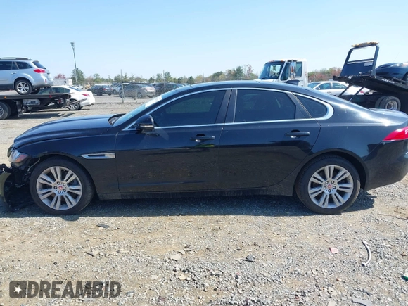 2017 Jaguar XF 35t Premium with VIN SAJBJ4BV2HCY37415, listed as a IAAI auction lot 41902754 with 93,275 mi miles and . Bid and sale history available at DreamBid. Image 14.