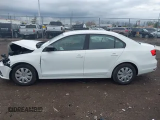 2015 Volkswagen Jetta Sedan 2.0L S with VIN 3VW2K7AJ5FM313969, listed as a IAAI auction lot 41951550 with 104,735 mi miles. Bid and sale history available at carsss.com. Image 14.