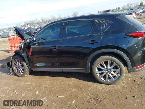 2021 Mazda CX-5 Grand Touring with VIN JM3KFBDM0M1357587, listed as a IAAI auction lot 41680245 with 1 mi miles. Bid and sale history available at carsss.com. Image 14.