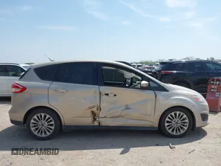 2018 Ford C-Max SE with VIN 1FADP5AU8JL102227, listed as a IAAI auction lot 42062394 with 122,943 mi miles. Bid and sale history available at carsss.com. Image 13.