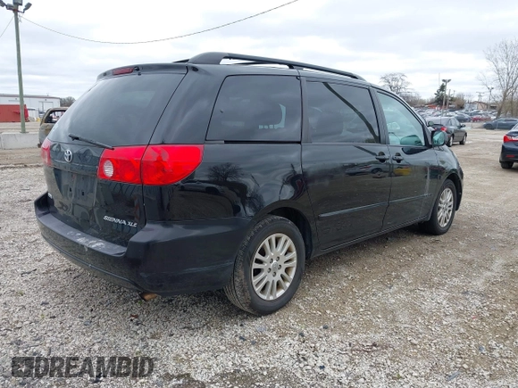 2010 Toyota Sienna XLE with VIN 5TDYK4CC1AS309856, listed as a IAAI auction lot 42089020 with 142,165 mi miles. Bid and sale history available at carsss.com. Image 4.