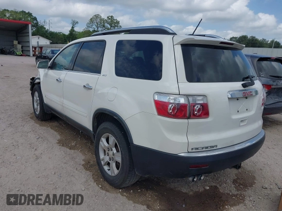 2009 GMC Acadia SLT1 with VIN 1GKER23D09J117644, listed as a IAAI auction lot 42041513 with 217,888 mi miles. Bid and sale history available at carsss.com. Image 3.
