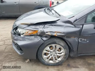 2015 Honda Civic Coupe LX with VIN 2HGFG3B58FH504642, listed as a IAAI auction lot 41672862 with 169,192 mi miles. Bid and sale history available at carsss.com. Image 6.