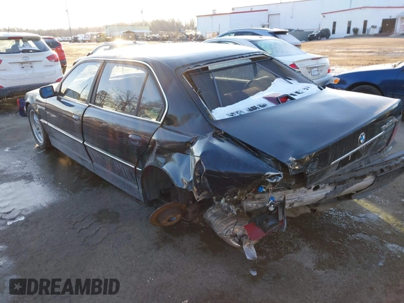 2000 BMW 7 Series 740iL with VIN WBAGH8345YDP12154, listed as a IAAI auction lot 41369212 with 210,094 mi miles. Bid and sale history available at carsss.com. Image 3.