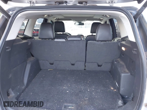 2013 Ford Escape Titanium with VIN 1FMCU0J90DUC13877, listed as a IAAI auction lot 42370172 with 119,745 mi miles and . Bid and sale history available at DreamBid. Image 12.