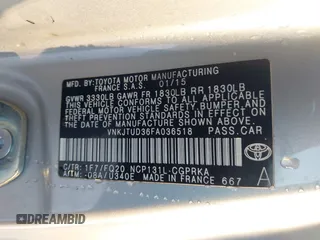 2015 Toyota Yaris L with VIN VNKJTUD36FA036518, listed as a IAAI auction lot 41233406 with 138,481 mi miles. Bid and sale history available at carsss.com. Image 9.