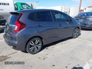 2019 Honda Fit EX-L z VIN 3HGGK5H01KM721343, wystawiony jako IAAI lot #41945425 z przebiegiem 23 312 mil mil oraz . Historia ofert i sprzedaży dostępna na DreamBid. Obrazek 4.