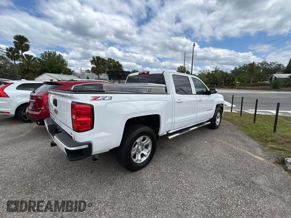 2018 Chevrolet Silverado 1500 LT with VIN 3GCUKREC4JG432719, listed as a Copart auction lot 52822625 with 161,100 mi miles and Clean Title. Bid and sale history available at carsss.com. Image 4.