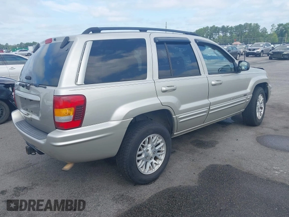2004 Jeep Grand Cherokee Limited with VIN 1J4GX58SX4C255363, listed as a IAAI auction lot 42619798 with 239,475 mi miles and . Bid and sale history available at DreamBid. Image 4.