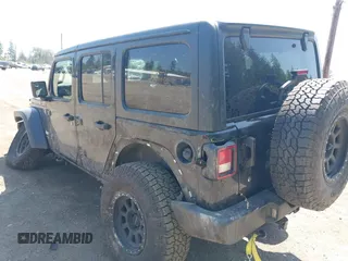 2018 Jeep Wrangler Unlimited Sport S with VIN 1C4HJXDN1JW216825, listed as a IAAI auction lot 42405799 with 37,194 mi miles and . Bid and sale history available at DreamBid. Image 3.