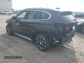 2021 BMW X1 xDrive28i with VIN WBXJG9C05M5T83784, listed as a IAAI auction lot 41696073 with 15,865 mi miles and . Bid and sale history available at DreamBid. Image 3.
