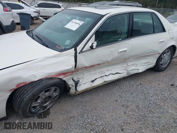 2005 Cadillac DeVille z VIN 1G6KD54Y75U162964, wystawiony jako IAAI lot #40794096 z przebiegiem 165 341 mil mil oraz . Historia ofert i sprzedaży dostępna na DreamBid. Obrazek 6.