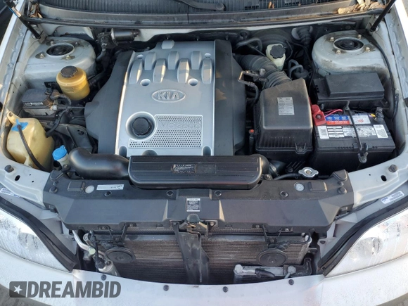 2004 Kia Sedona LX with VIN KNDUP131046591151, listed as a Copart auction lot 82201894 with 147,194 mi miles and Salvage Title. Bid and sale history available at carsss.com. Image 12.