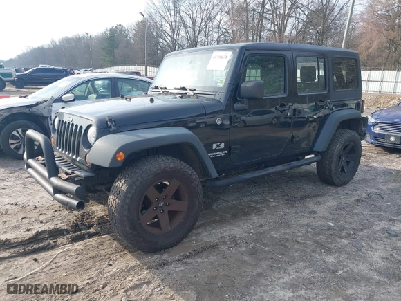 2008 Jeep Wrangler Unlimited X with VIN 1J4GA39148L648910, listed as a IAAI auction lot 41790678 with 93,528 mi miles. Bid and sale history available at carsss.com. Image 18.