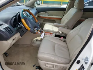2008 Lexus RX 400h with VIN JTJHW31U282857051, listed as a Copart auction lot 52996275 with 178,118 mi miles and Salvage Title. Bid and sale history available at DreamBid. Image 7.