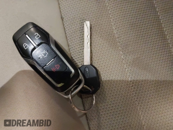 2015 Ford Edge SE with VIN 2FMTK3G98FBB76309, listed as a IAAI auction lot 42213403 with 58,237 mi miles and . Bid and sale history available at DreamBid. Image 11.
