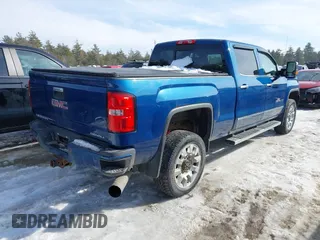 2015 GMC Sierra 2500HD available WiFi Denali with VIN 1GT120E8XFF623208, listed as a IAAI auction lot 41607260 with 98,032 mi miles. Bid and sale history available at carsss.com. Image 4.