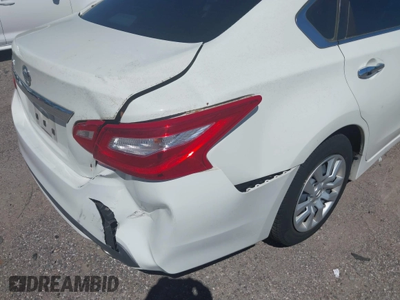 2016 Nissan Altima S with VIN 1N4AL3AP4GC251529, listed as a IAAI auction lot 41825719 with 159,396 mi miles and . Bid and sale history available at DreamBid. Image 6.