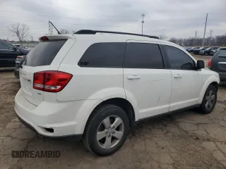 2012 Dodge Journey SXT with VIN 3C4PDCBG0CT331294, listed as a Copart auction lot 52066075 with 216,470 mi miles and Clean title. Bid and sale history available at DreamBid. Image 3.