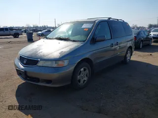 2000 Honda Odyssey EX z VIN 2HKRL187XYH619354, wystawiony jako IAAI lot #41461901 z przebiegiem Nie podano mil oraz . Historia ofert i sprzedaży dostępna na DreamBid. Obrazek 2.