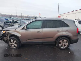 2013 Kia Sorento EX with VIN 5XYKUDA64DG320588, listed as a IAAI auction lot 41204828 with 164,146 mi miles. Bid and sale history available at carsss.com. Image 14.