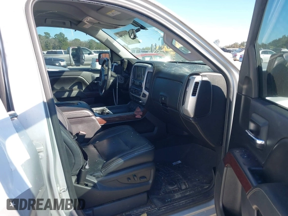 2017 GMC Sierra 1500 SLE with VIN 3GTU2MEC3HG199980, listed as a IAAI auction lot 40534708 with 129,765 mi miles and . Bid and sale history available at DreamBid. Image 5.