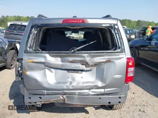 2014 Jeep Patriot Latitude with VIN 1C4NJPFA4ED535148, listed as a IAAI auction lot 42037942 with 192,493 mi miles and . Bid and sale history available at carsss.com. Image 6.